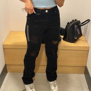 Ripped black jeans 90s Straight. Refuge Denim.